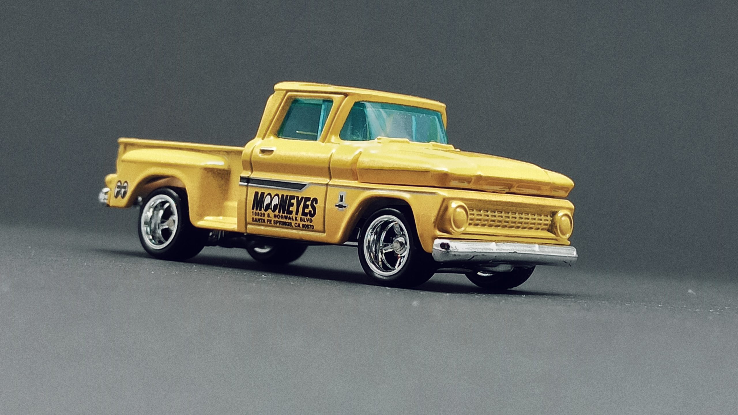 Matchbox Collectors Series '63 Chevy C10 Pickup Truck 1963 (GRK24) 2021 (3/20) yellow (Mooneyes) side angle